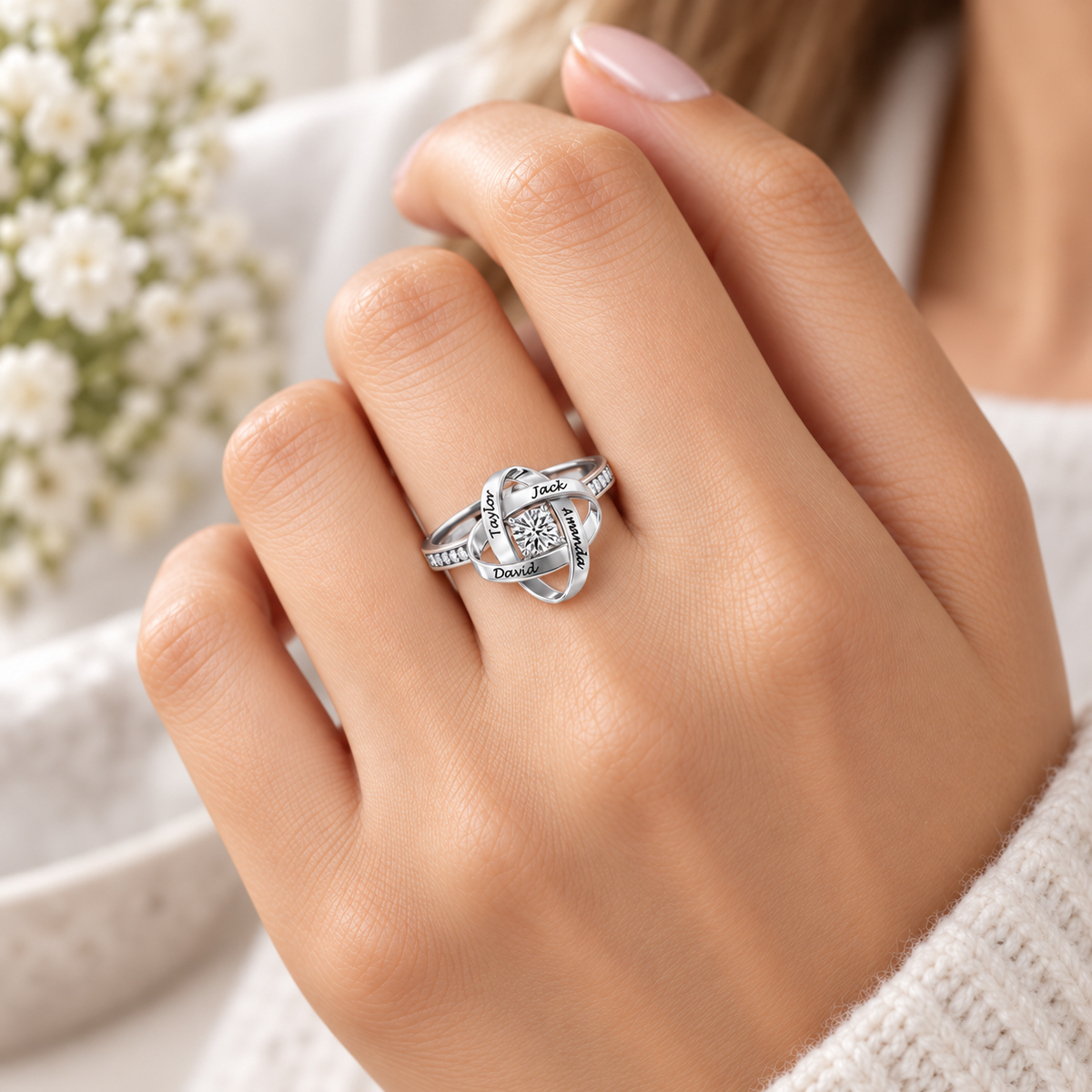The Family Knot Name Ring in Silver worn on the hand
