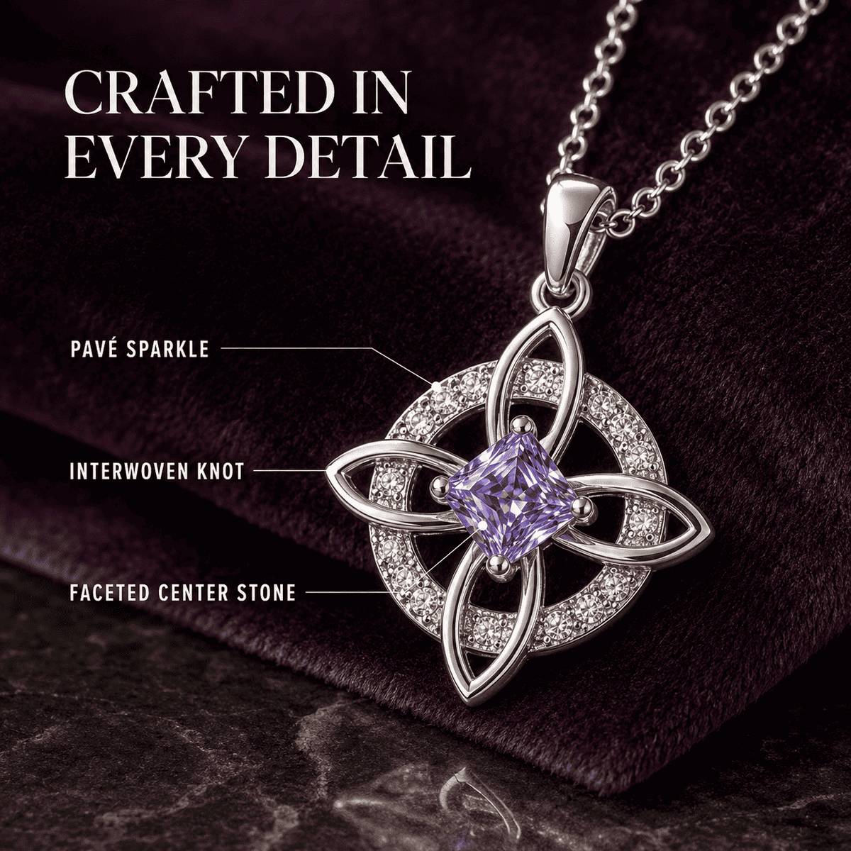 Close-up of the interwoven knot, sparkling halo and faceted birthstone