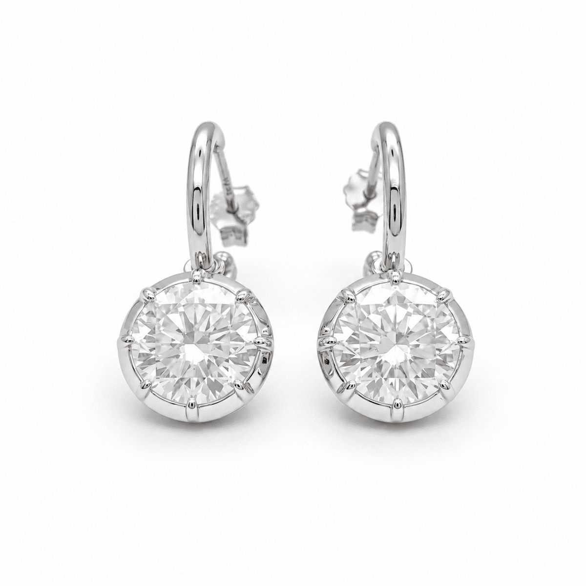 The Lumière Moissanite Drop Earrings — Silver, white background